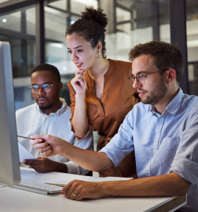 image of people working together at a computer